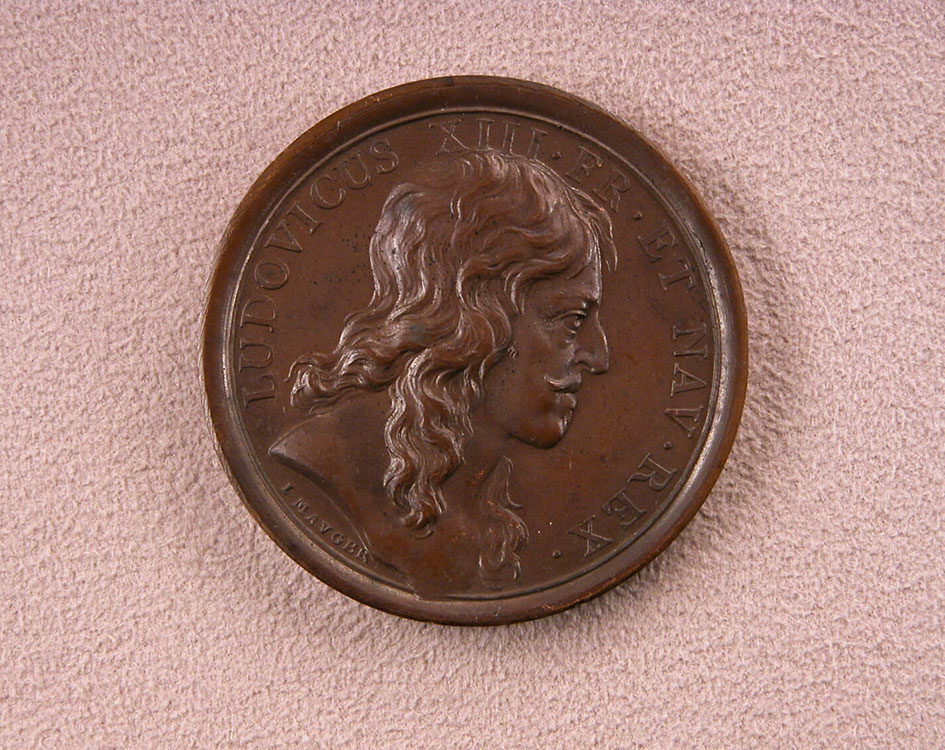 Médaille en bronze avec le profil du roi Louis XIV